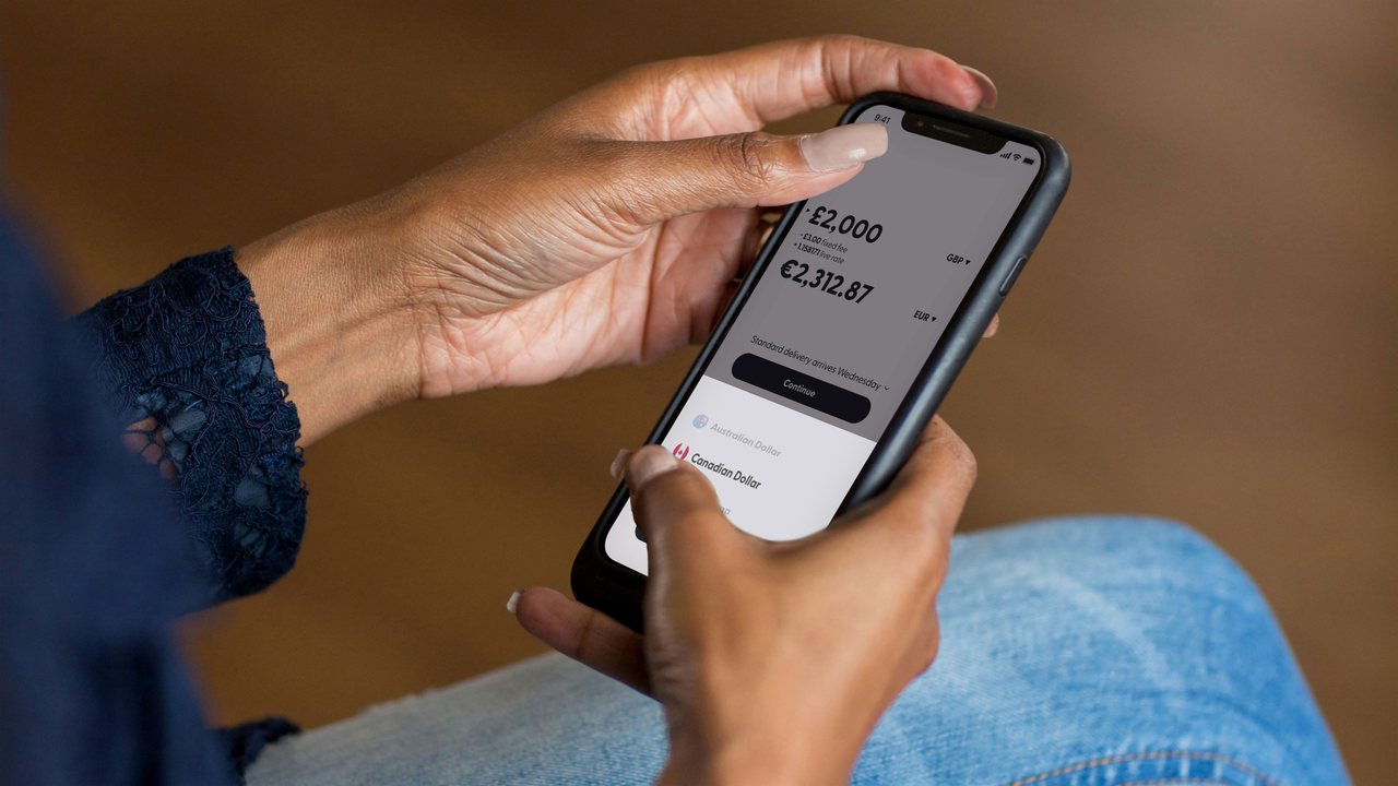 Close-up of someone checking account balances in a banking app